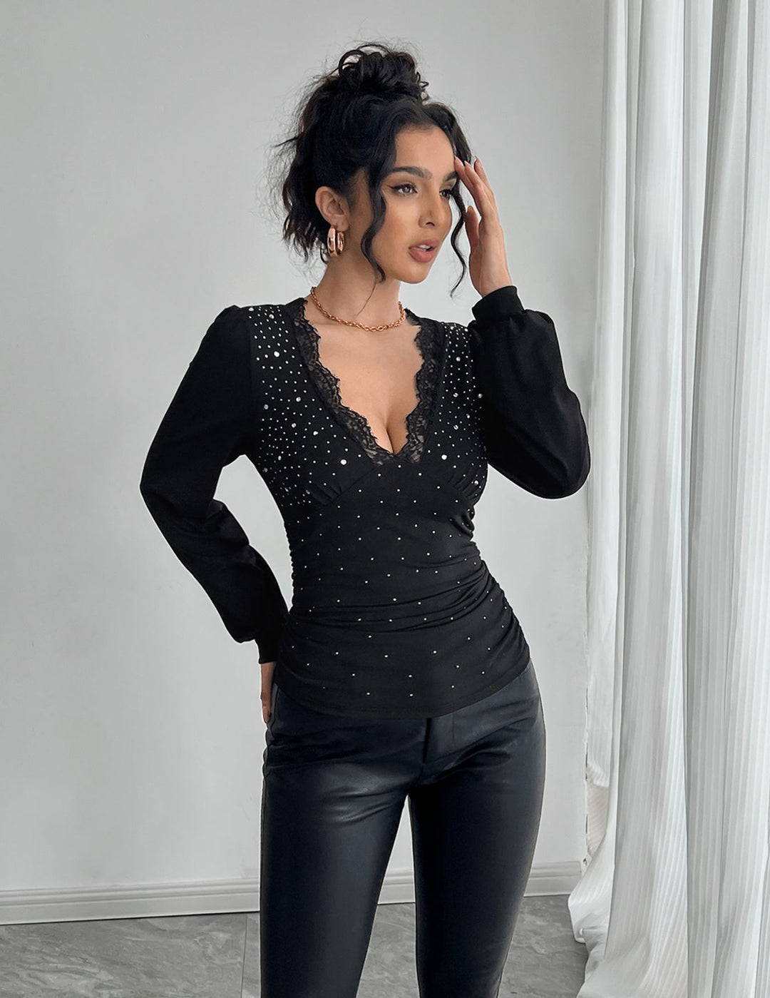 Women's tailored long sleeve shirt with deep lace décolletage, gathering, and crystal embellishment Mune Fashion