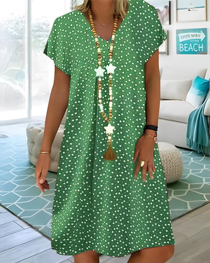 Ladies nan locker falling V-neck short dress with A-line cut, cap sleeves and all-over heart print Mune Fashion