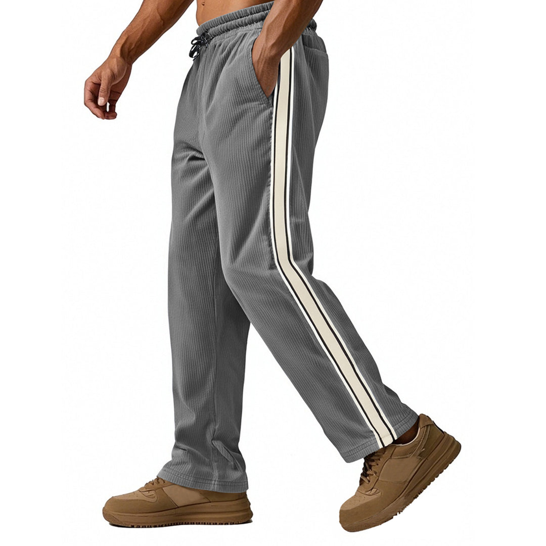 Men's loose training pants in corduroy look with drawstring waistband and side contrast stripes Mune Fashion