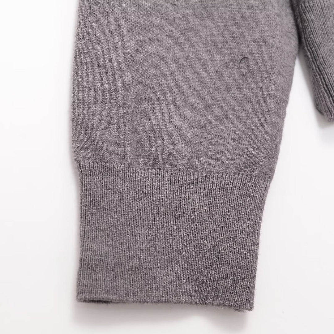 Women’s polo collar fine knit sweater with button placket and ribbed hem Mune Fashion