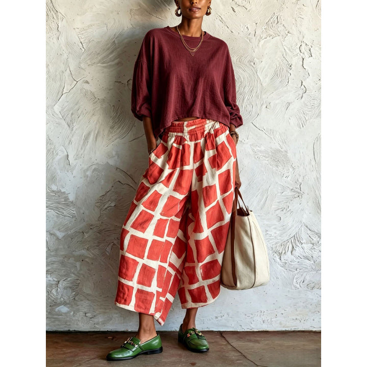 Women's patterned culotte palazzo pants with wide legs, elastic waistband, and side pockets