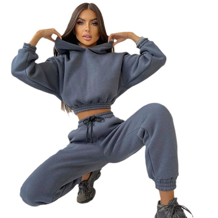 Women's cropped stand collar sweatshirt set with elastic waistband and high-waisted tapered joggers Mune Fashion
