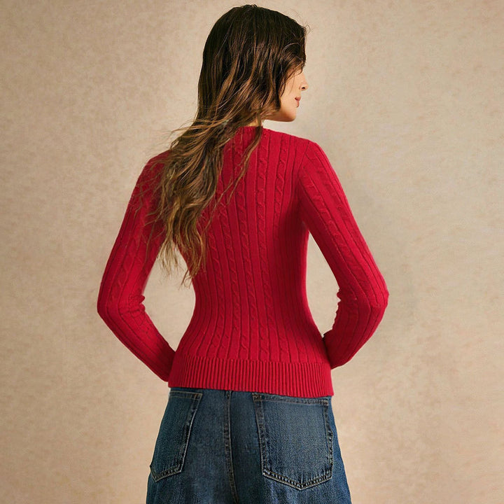 Women's fitted cable knit pullover with V-neck and tailored ribbed structure