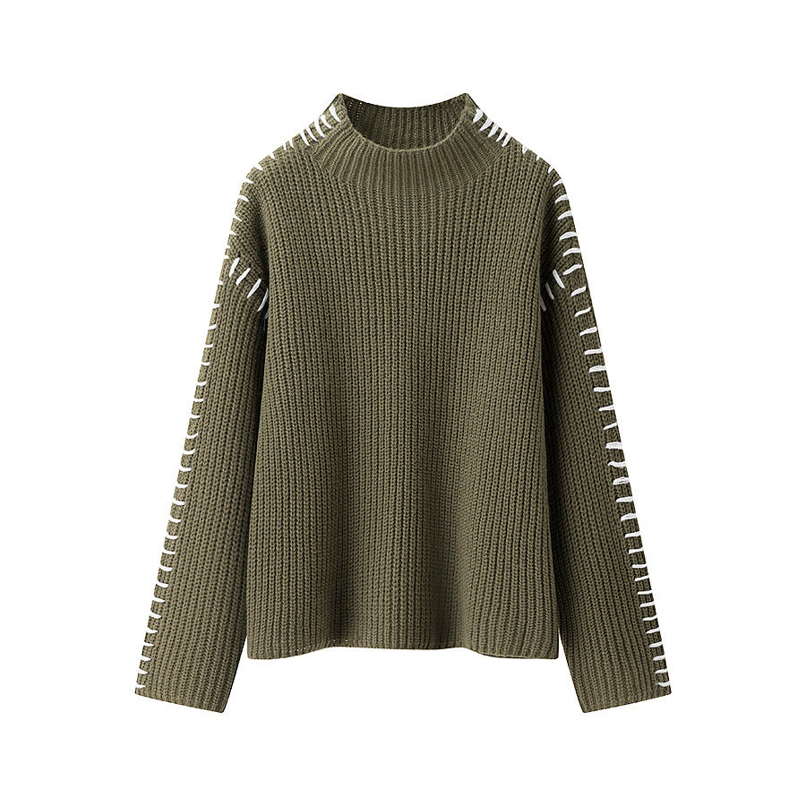 Women's chunky knit oversized sweater with high roll neck edge and decorative stitch sleeves Mune Fashion