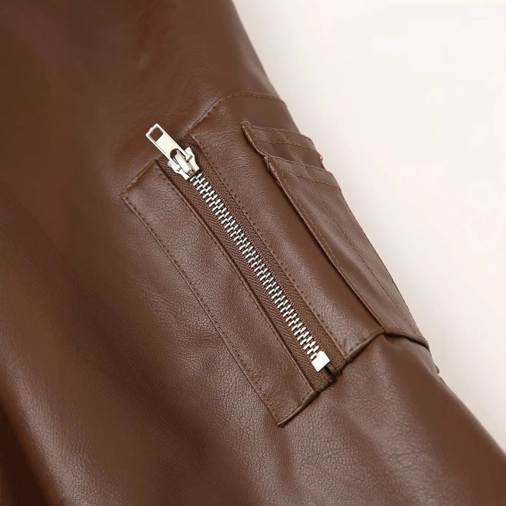 Women's fitted short faux leather bomber jacket with sleeve zipper and ribbed cuffs Mune Fashion