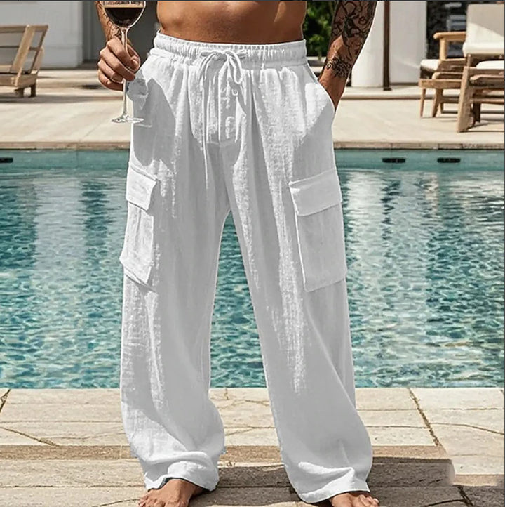 Men's loose linen look cargo pants with elastic drawstring waistband and applied flap pockets Mune Fashion