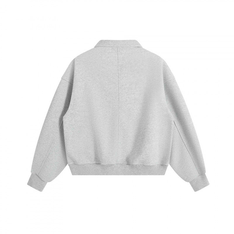 Unisex Boxy Polo Sweatshirt with Henley button placket, raglan sleeves and side pockets Mune Fashion
