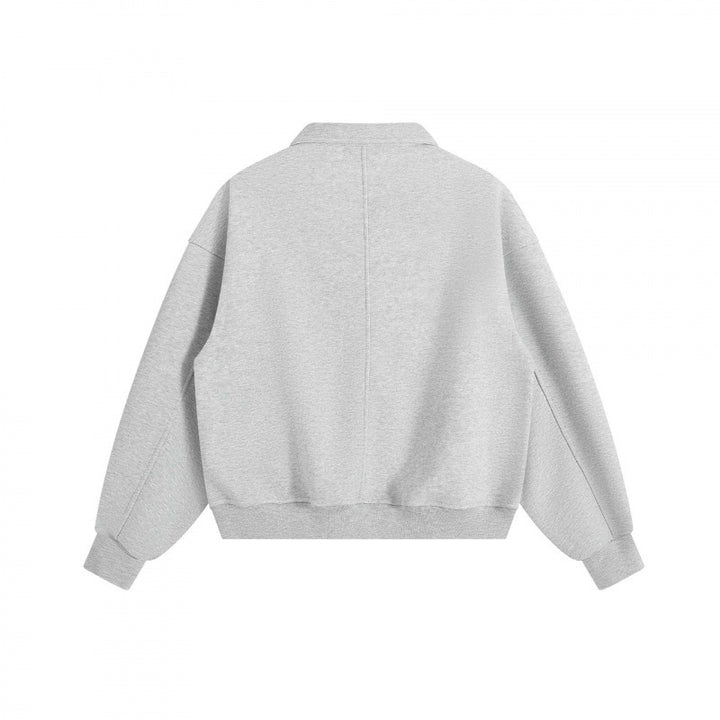 Unisex Boxy Polo Sweatshirt with Henley button placket, raglan sleeves and side pockets Mune Fashion