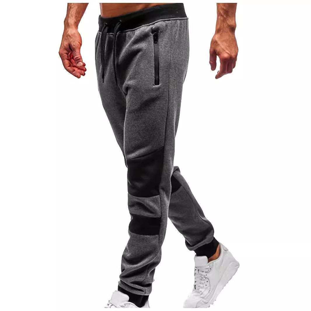 Men's slim-fit jogging pants with zip pockets, elastic comfort waistband, and reinforced knee panels Mune Fashion