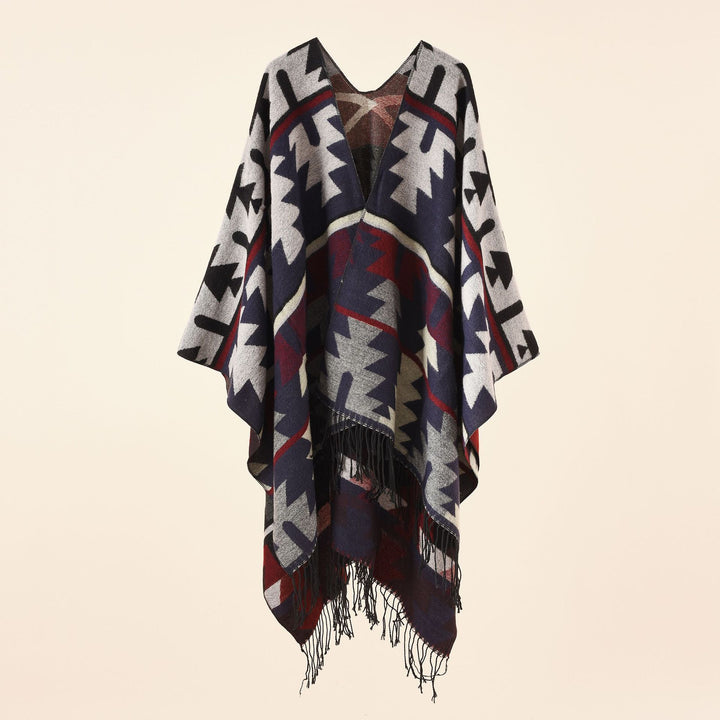 Women Oversize Ruana with V-neck, coarse jacquard pattern and long fringes Mune Fashion
