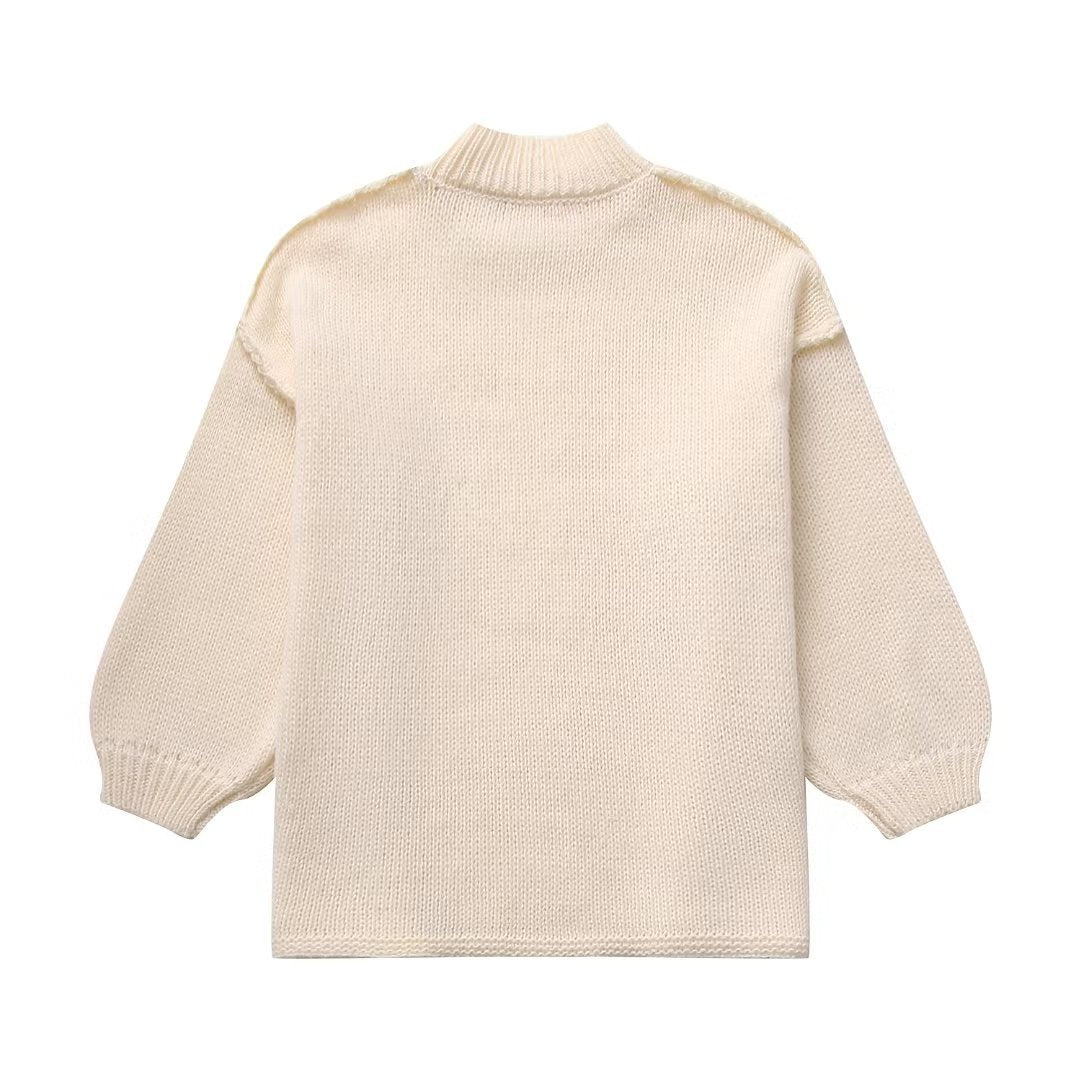 Women's chunky knit sweater with standing collar, dropped shoulders, and balloon sleeves Mune Fashion