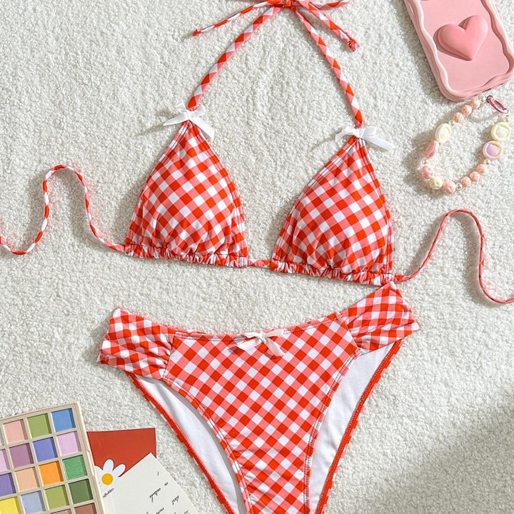 Women's triangle bikini with adjustable lacing details and charming ruffled accents Mune Fashion