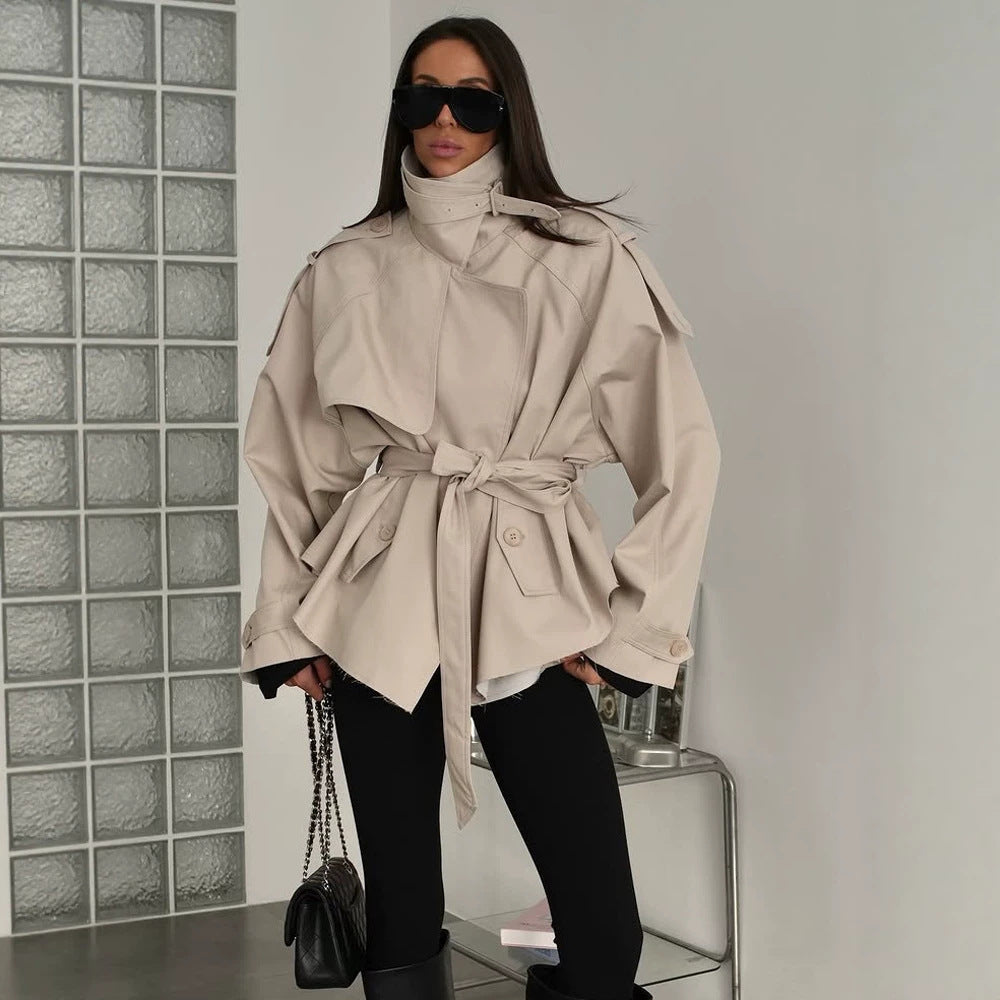 Women's short trench coat with wide standing collar, shoulder epaulettes, and waist belt Mune Fashion