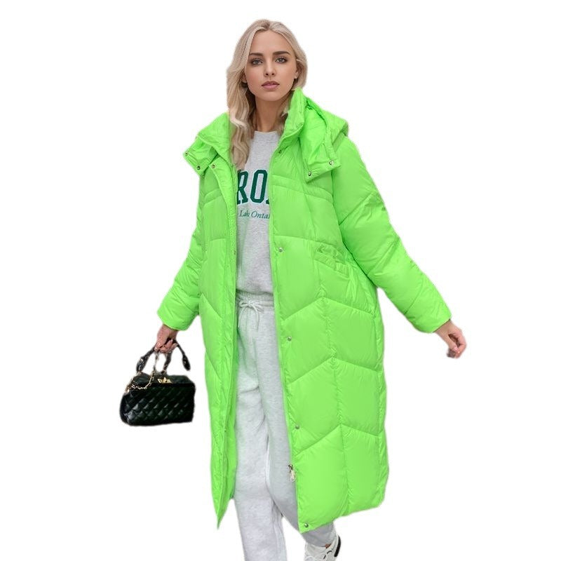 Mune | Women's long insulated puffer jacket with voluminous cut and practical side pockets