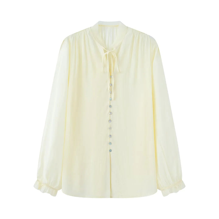 Women's delicate long sleeve blouse with tie ribbon at the neck and fine button placket Mune Fashion