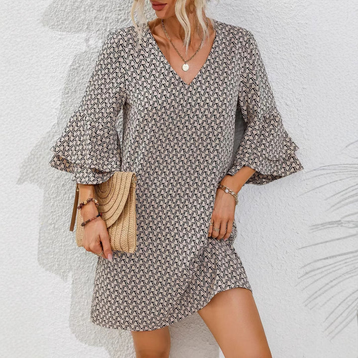 Women's flowing tunic mini dress with V-neck graphic chain pattern and double-layered bell sleeves Mune Fashion