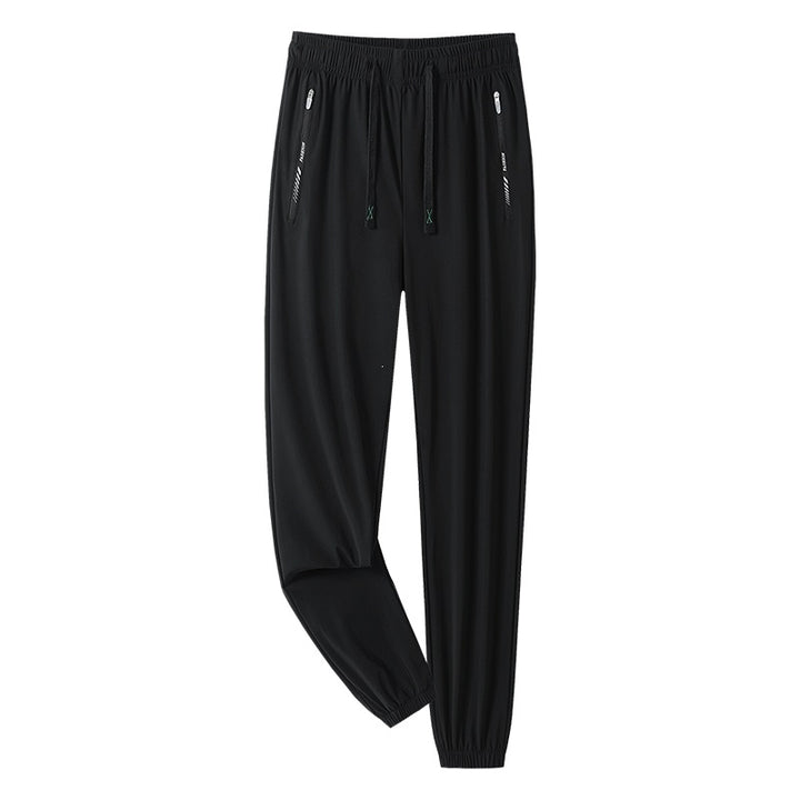 Men's sporty jogging pants with adjustable waistband and zippered pockets Mune Fashion