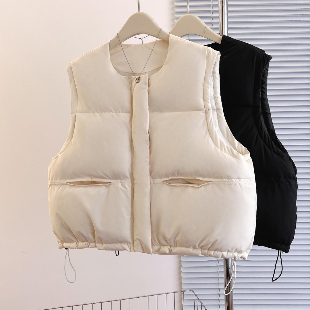 Women's short padded quilted vest with drawstring hem and round neck Mune Fashion