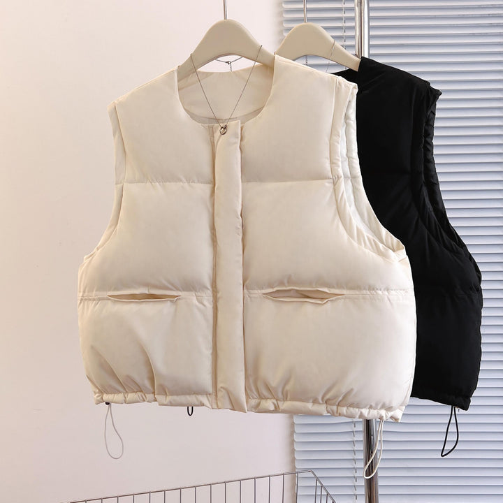 Women's short padded quilted vest with drawstring hem and round neck Mune Fashion
