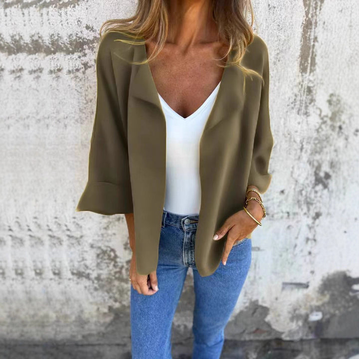 Women's light open knit cardigan with shawl collar, roll-up sleeves and boxy silhouette Mune Fashion
