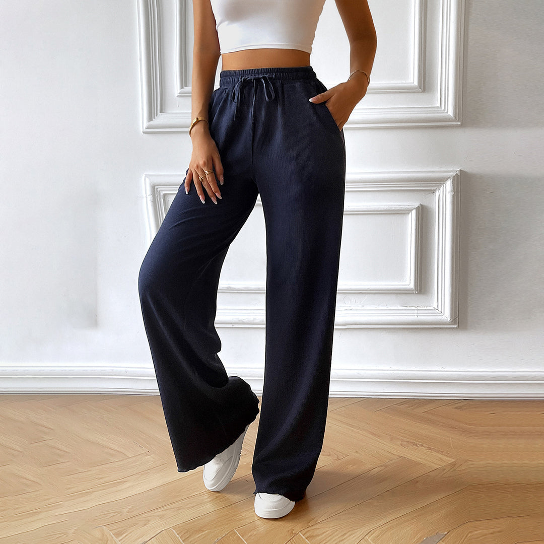 Women's wide lounge pants with elastic waistband, drawstring and side pockets Mune Fashion