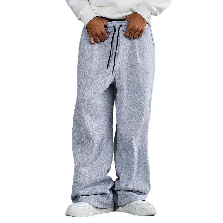 Men's wide Relax fleece pants with a deep crotch, elastic drawstring waistband, and casual side pockets Mune Fashion