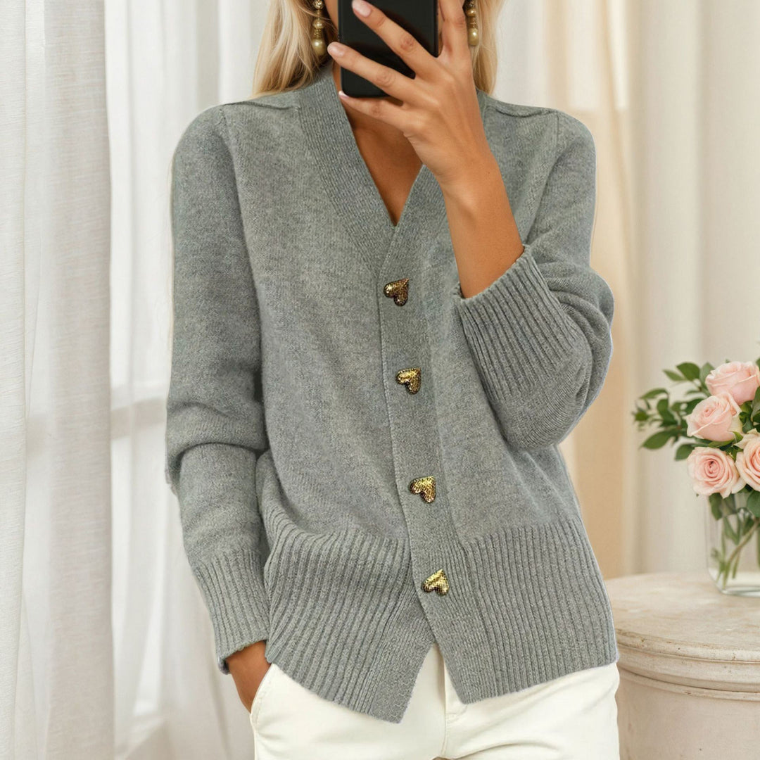 Women's loose knit cardigan with heart buttons and ribbed hem Mune Fashion