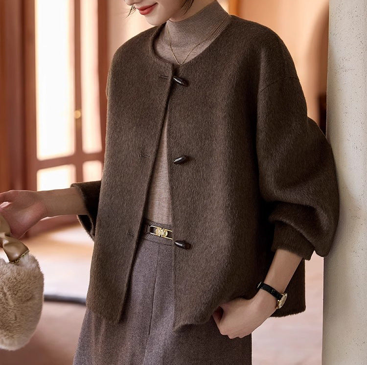 Women’s short wool blend jacket with round neckline, balloon sleeves, and toggle buttons Mune Fashion