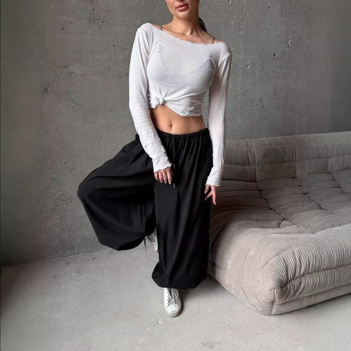 Women's wide harem balloon pants with high elastic waistband, drawstring, and casual wide fit.
