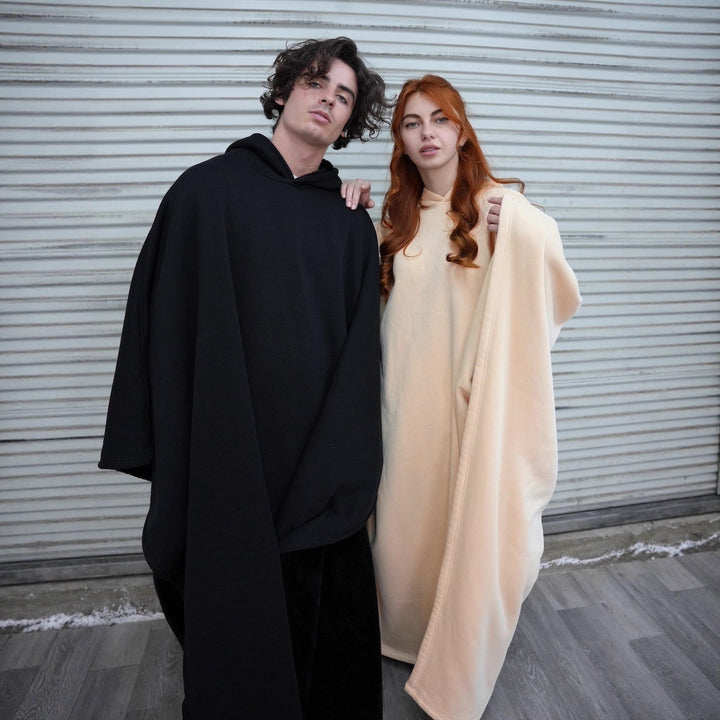 Unisex hooded poncho blanket with soft lining and generous oversized fit Mune Fashion