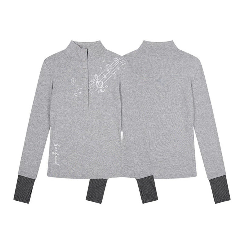 Women’s long-sleeve shirt with Henley button placket, contrast cuffs, and music note print Mune Fashion
