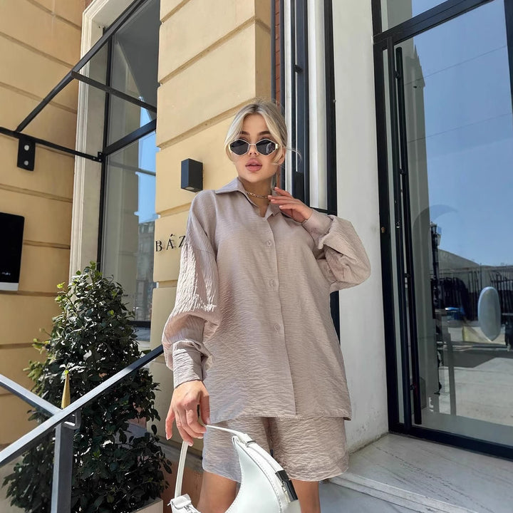 Women's two-piece textured loungewear set with oversized shirt and elastic waist shorts Mune Fashion