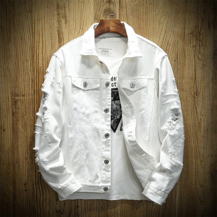 Unisex nan ripped denim jacket with loose fit and applied chest pockets Mune Fashion