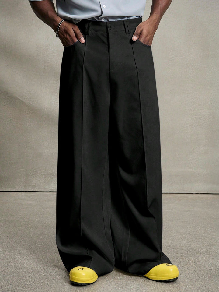 Men's wide pleated pants with high waistband, precise creases, and side inset pockets Mune Fashion