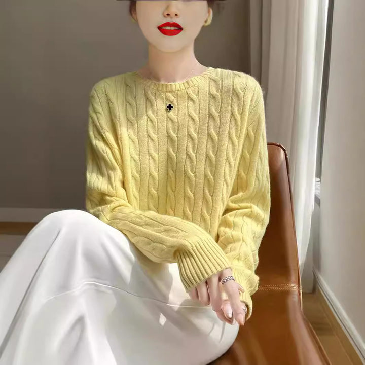 Women's cable knit round neck sweater made of soft wool blend with ribbed cuffs Mune Fashion