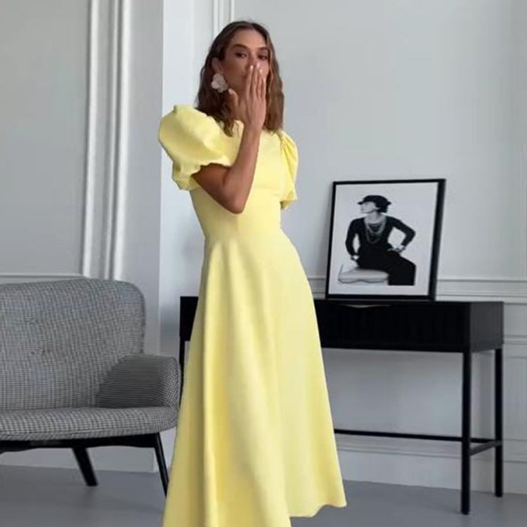 Women’s midi dress with a tailored A-line and voluminous puff sleeves Mune Fashion