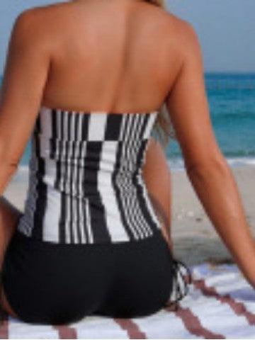 Women's sporty swimsuit with fashionable high collar and unique cut-out details Mune Fashion
