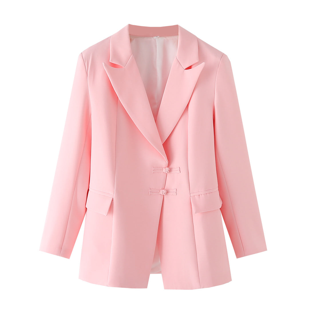 Women's elegant long blazer with decorative knot closures and flap pockets Mune Fashion