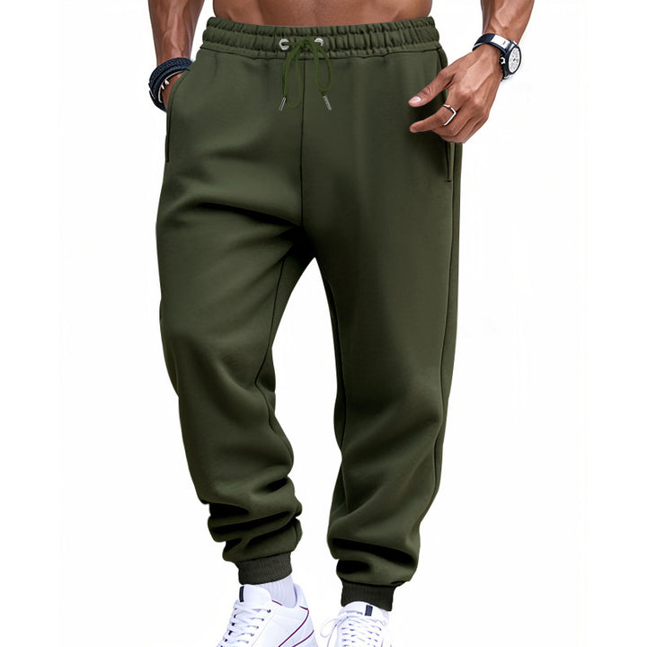Men's sporty sweat jogging pants with elastic tunnel drawstring waist, ribbed cuffs, and deep side pockets Mune Fashion