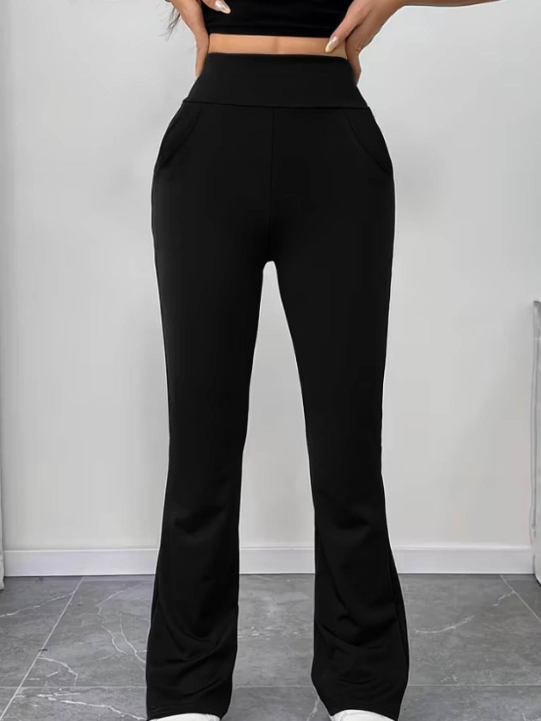 Women's flared pants made of stretch knit with high waist and side pockets Mune Fashion