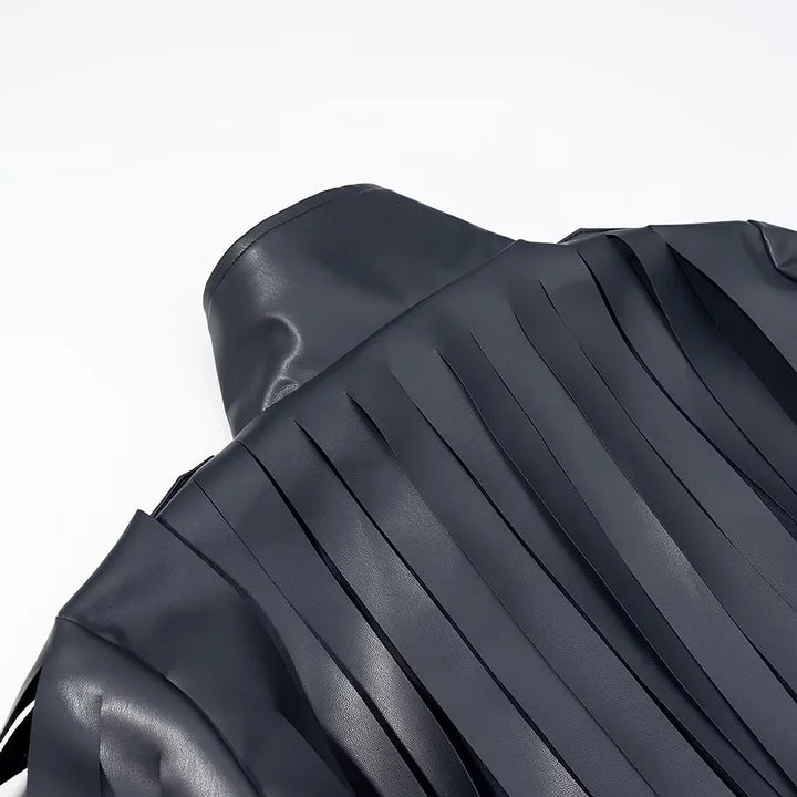 Women's faux leather blouse jacket with striped fringes, stand-up collar and waist belt Mune Fashion