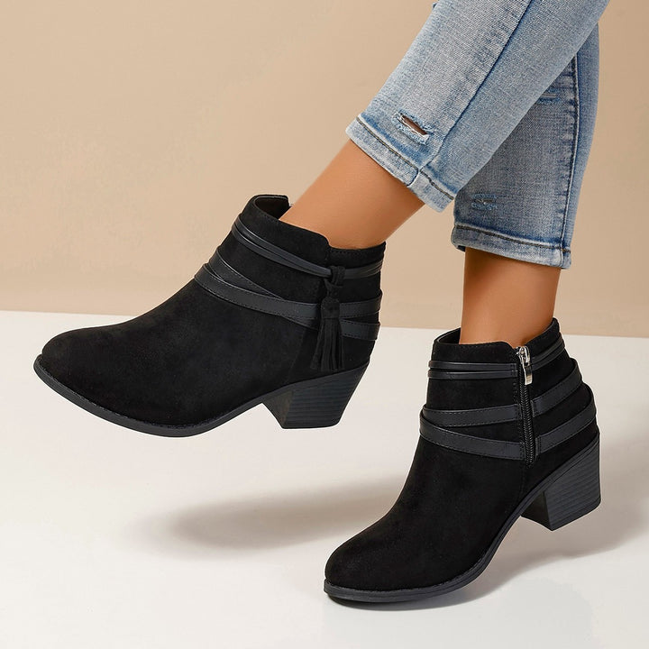 Ladies faux suede ankle boots with decorative straps, tassels, and side zipper Mune Fashion