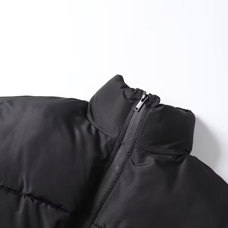 Ladies short padded bomber-style puffer jacket with high stand-up collar and elastic waistband Mune Fashion