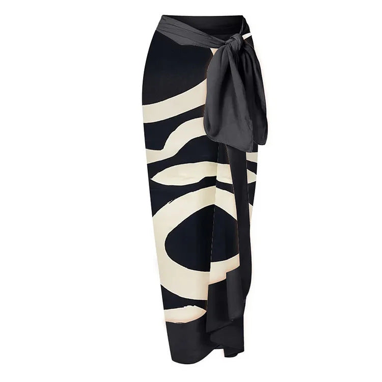 Women’s bikini set with asymmetric top and elegant wrap skirt Mune Fashion