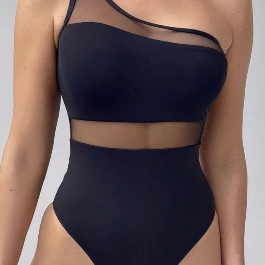 Women's one-piece swimsuit with asymmetrical cut and transparent accents Mune Fashion