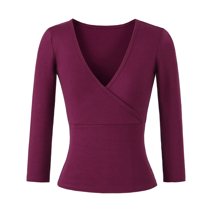 Women's figure-hugging wrap top made of stretch jersey with deep V-neck and tailored silhouette.