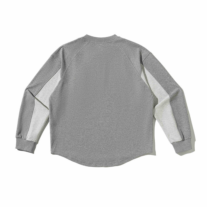 Unisex Raglan Sweatshirt with half-round hem and applied chest pocket Mune Fashion