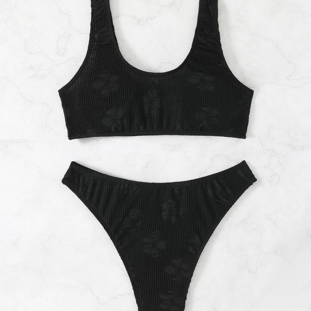 Women's bikini set with textured surface and deep neckline Mune Fashion
