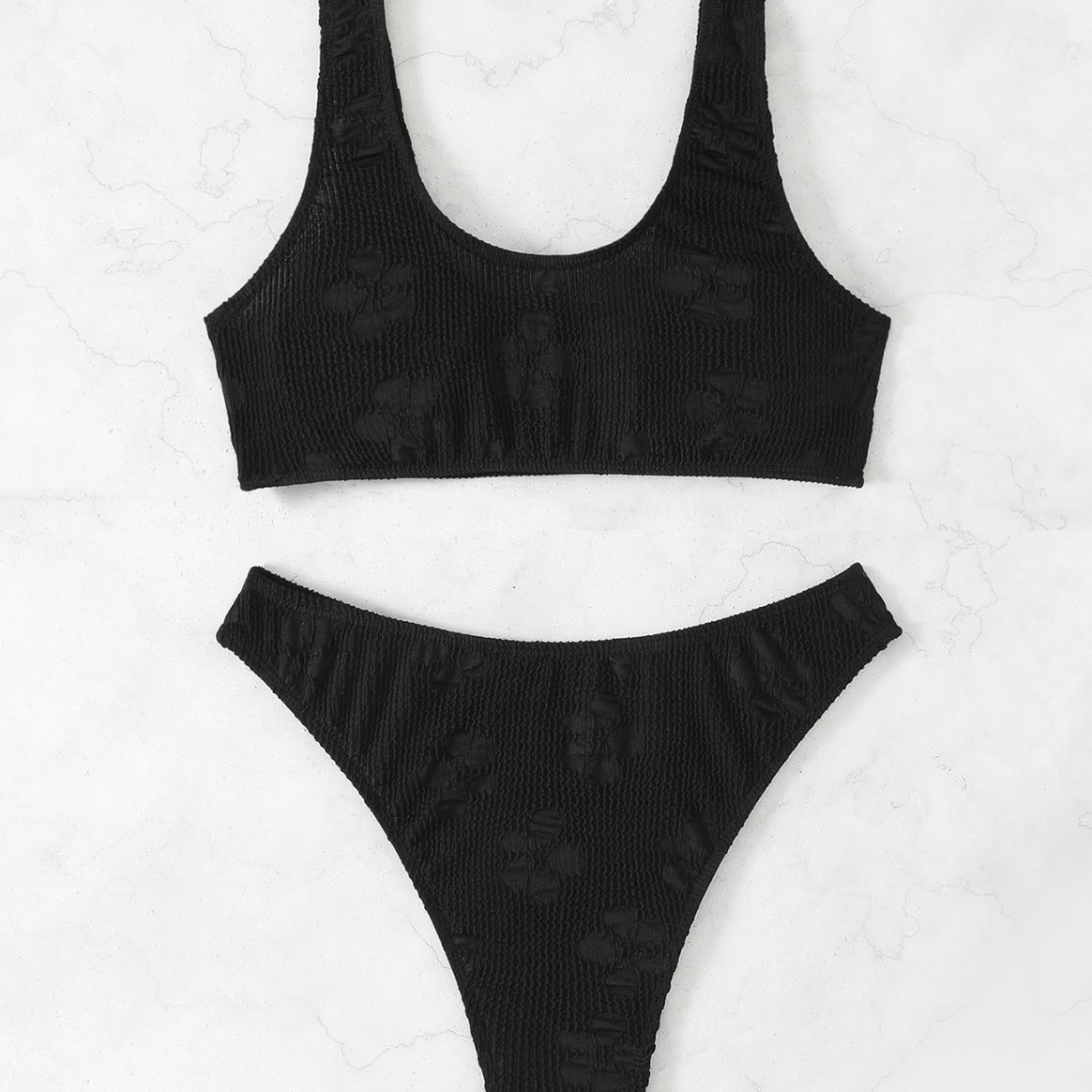 Women's bikini set with textured surface and deep neckline Mune Fashion