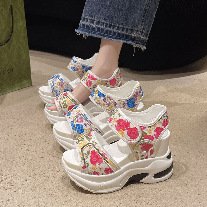 Women's chunky wedge heeled sandals with adjustable hook and loop straps and floral textile upper Mune Fashion
